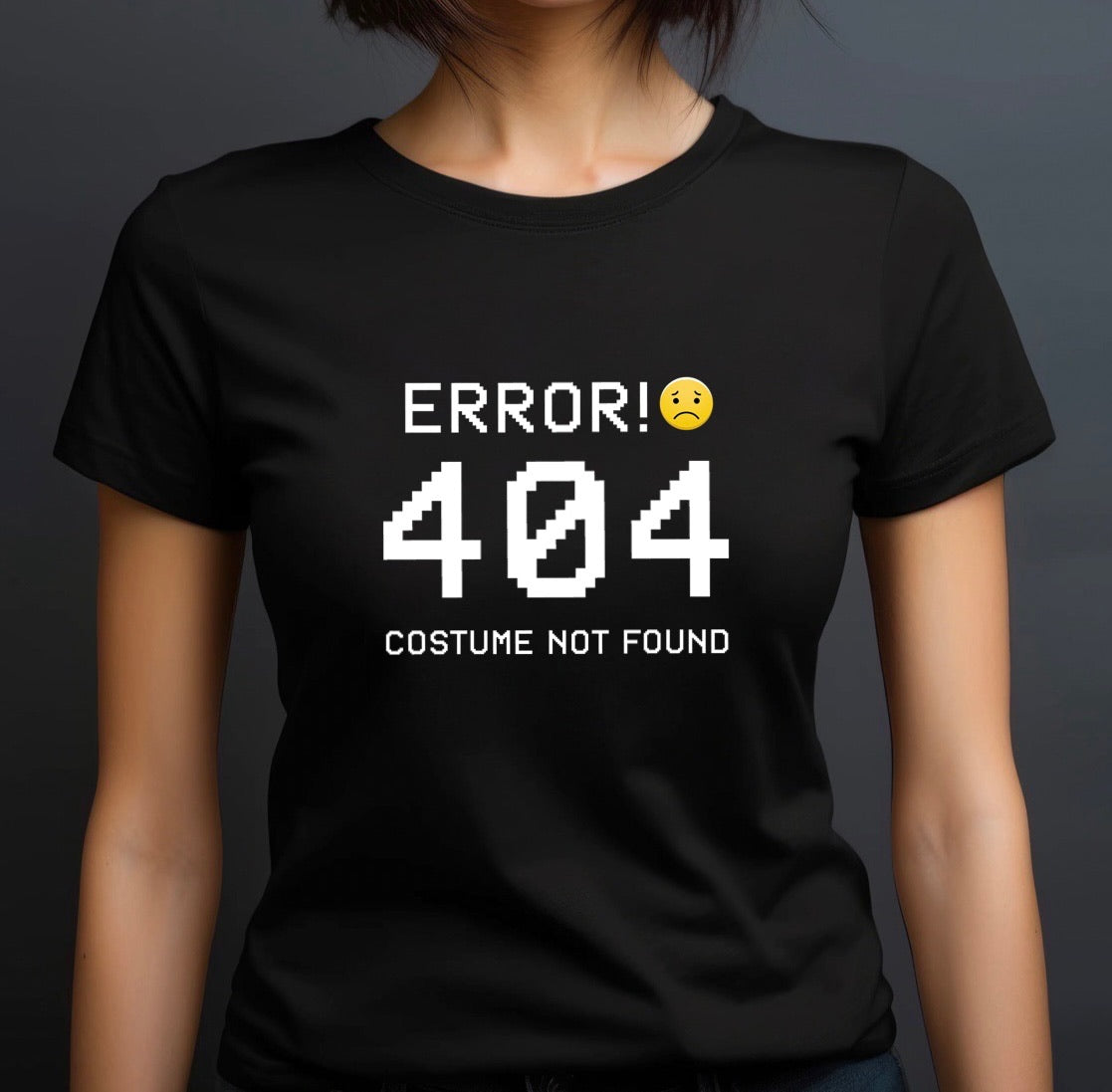Woman wearing black crew-neck Halloween T-shirt with bold white pixel letters reading Error 404 Costume Not Found.