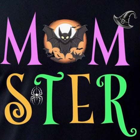 Close-up of Momster Halloween shirt featuring colorful letters with bat, spider, and witch hat graphics.