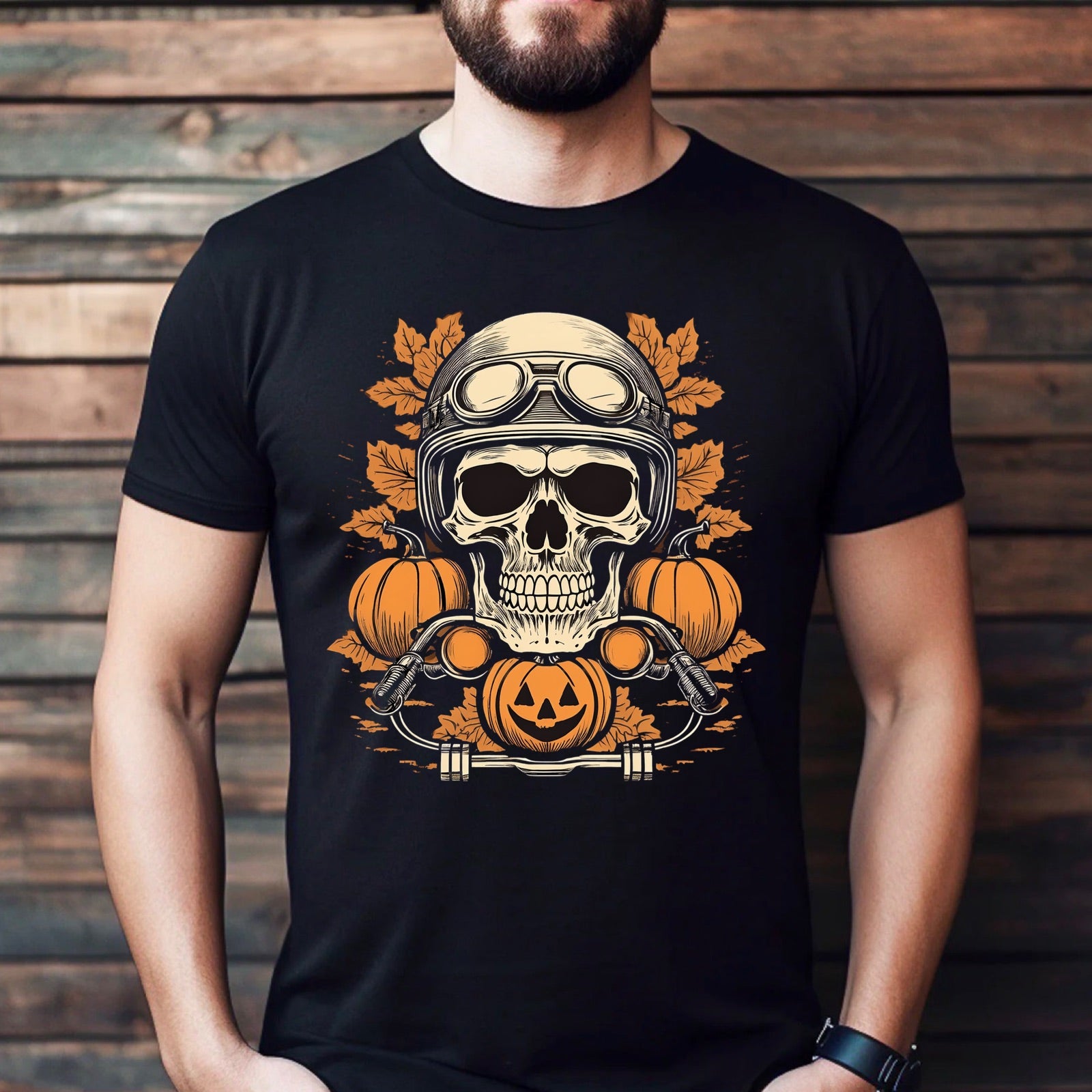Men’s Halloween biker t-shirt design with a skull helmet illustration, pumpkins, and autumn leaves for spooky fall style.