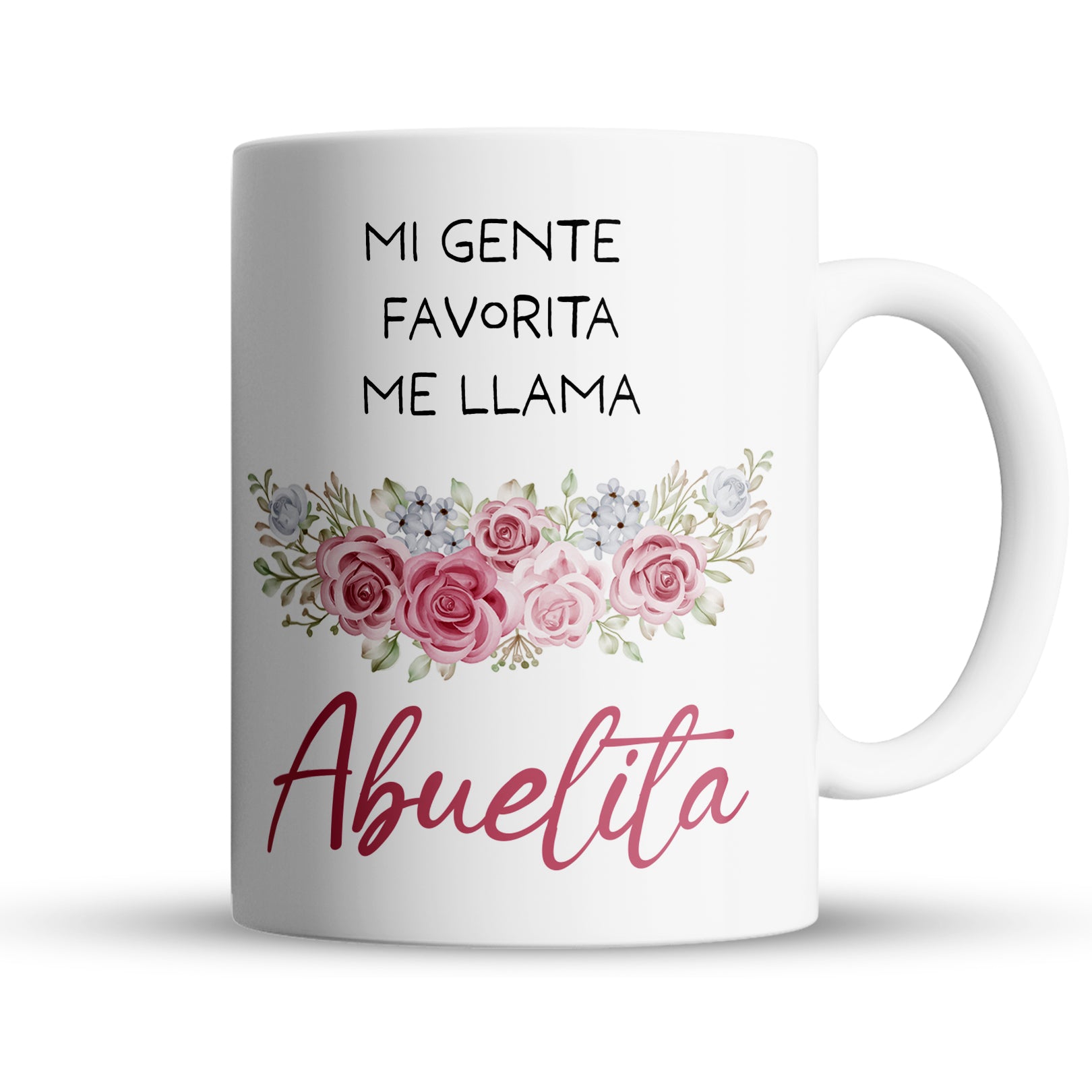 White ceramic mug with Spanish text Mi gente favorita me llama Abuelita and floral design.
