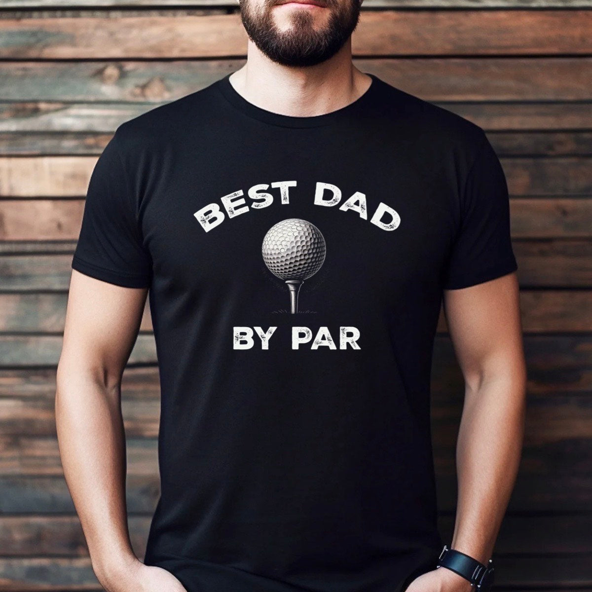Man wearing black Best Dad By Par golf shirt with golf ball design, perfect Fathers Day gift