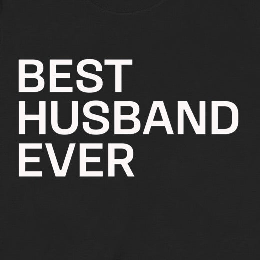 Closeup of black t-shirt showing white Best Husband Ever text in large bold letters
