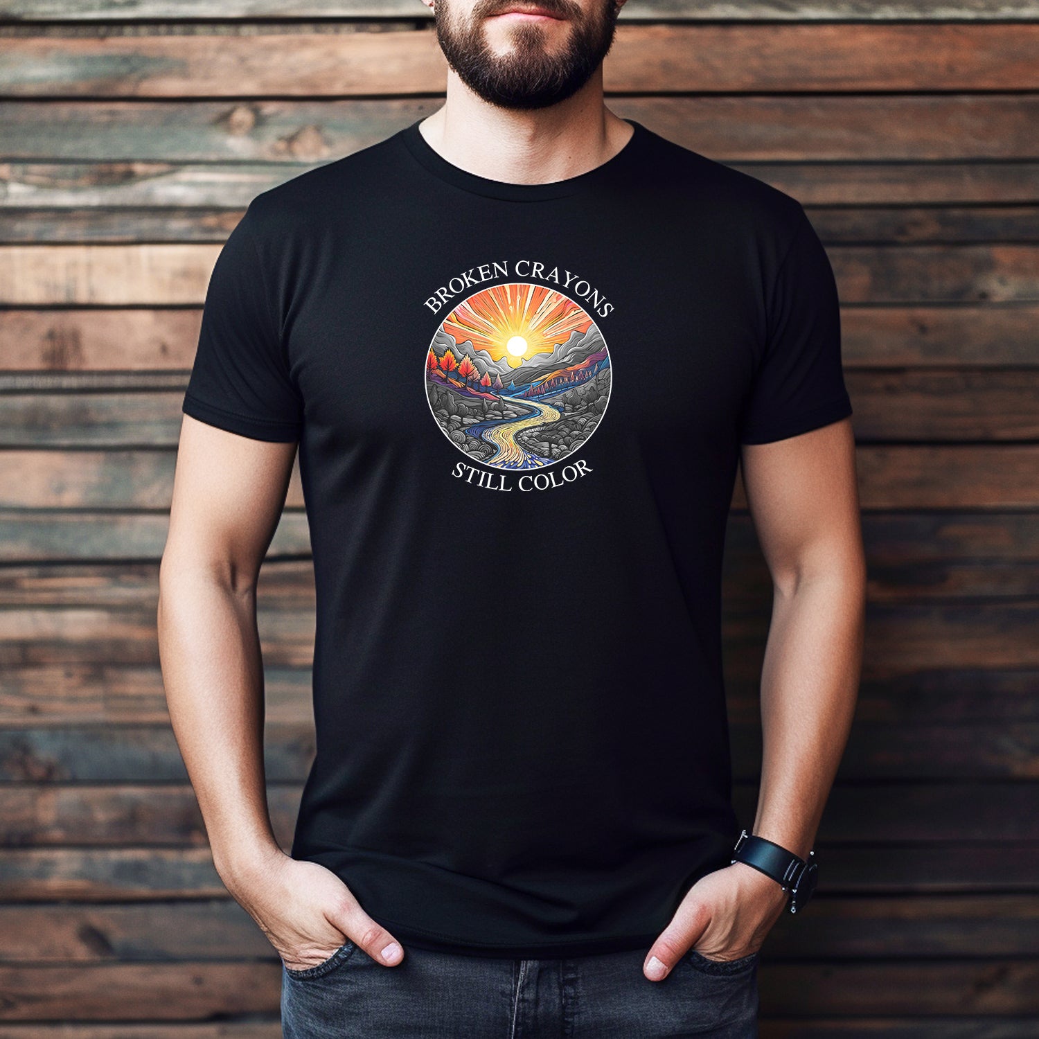 Men’s black crewneck t-shirt with inspirational broken crayons still color design featuring sunrise and mountains