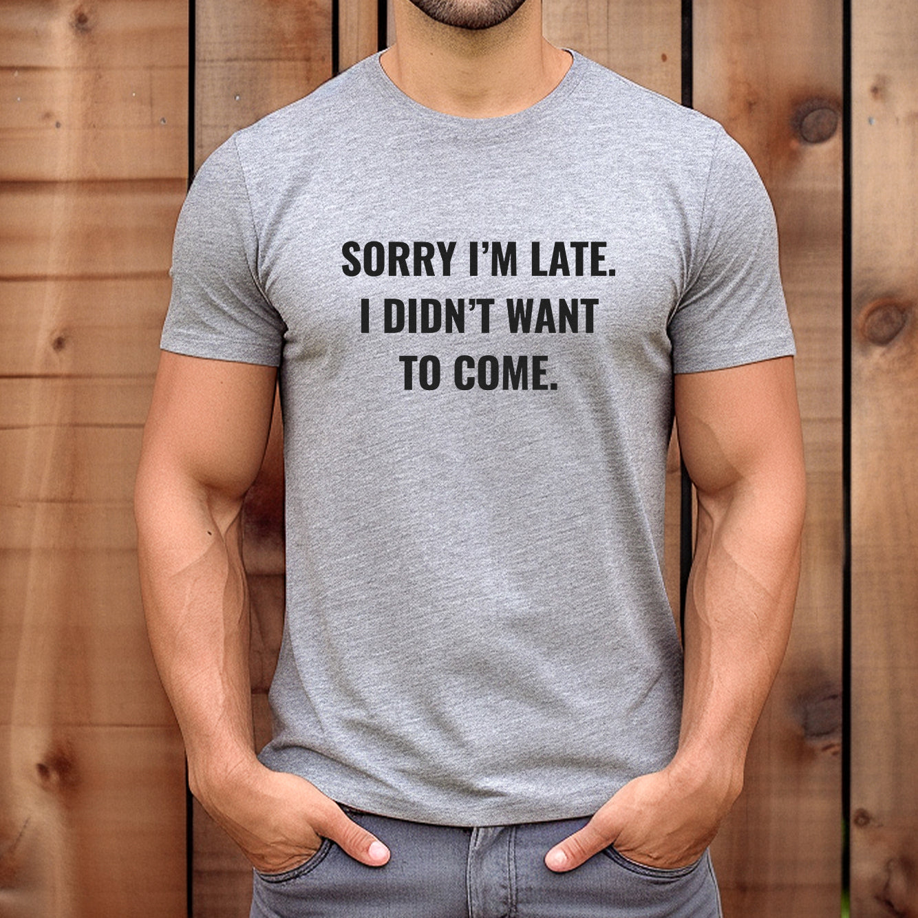 Man wearing grey graphic t-shirt with sarcastic quote sorry I’m late I didn’t want to come