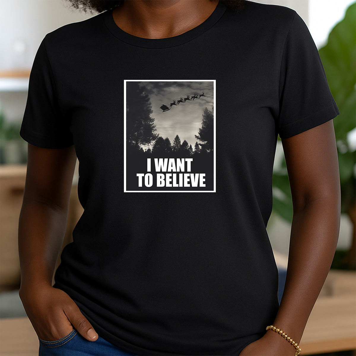 Women’s crew neck black Christmas t-shirt with Santa sleigh I Want to Believe design