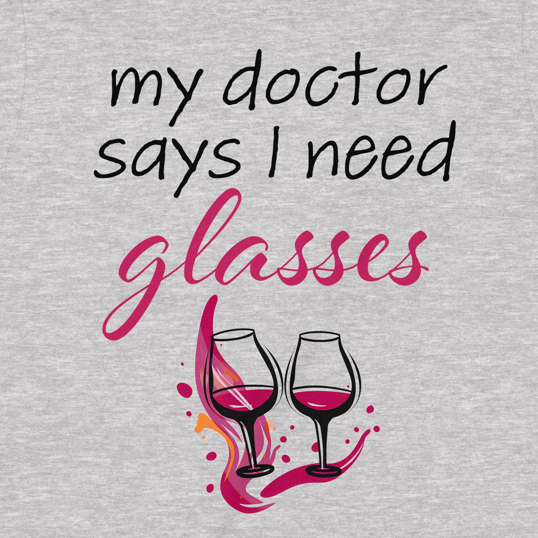 Close-up of graphic on grey t-shirt showing the phrase “My doctor says I need glasses” with two wine glasses illustration.