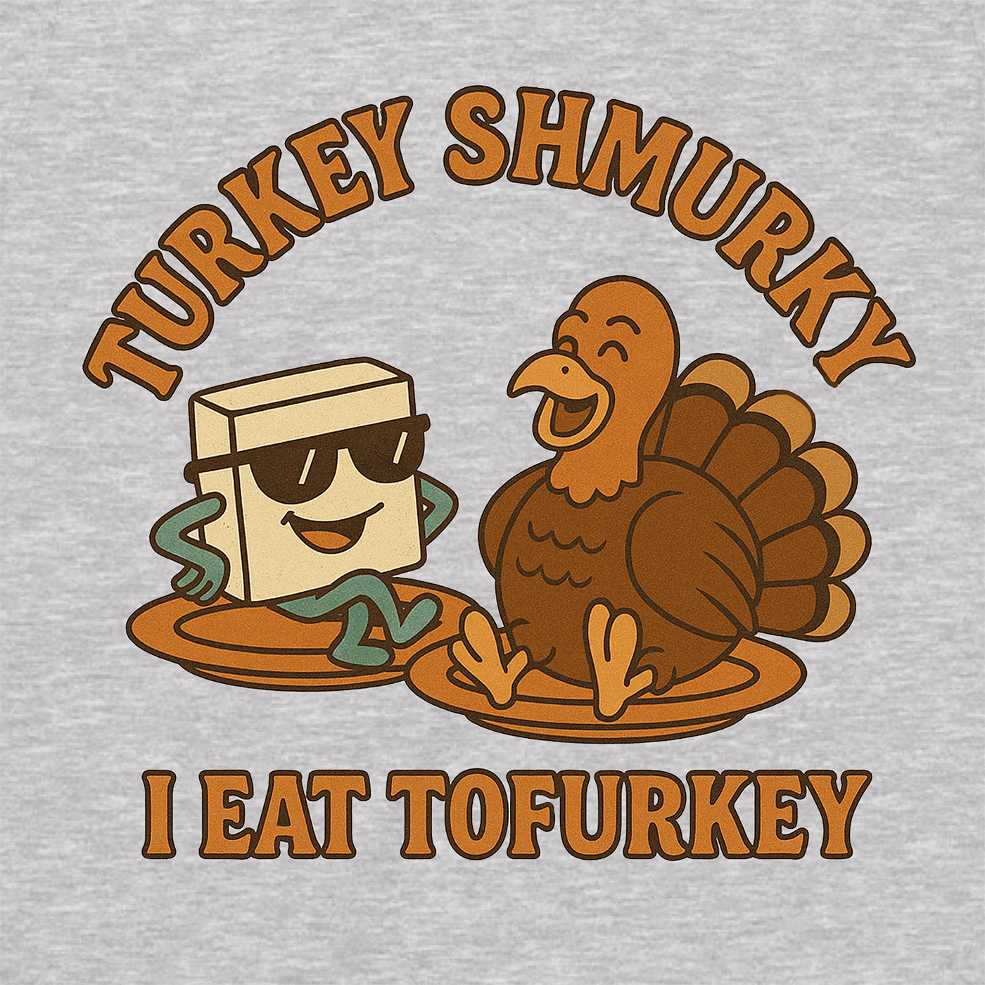 closeup of funny vegan thanksgiving shirt featuring smiling tofu with sunglasses and turkey with phrase i eat tofurkey