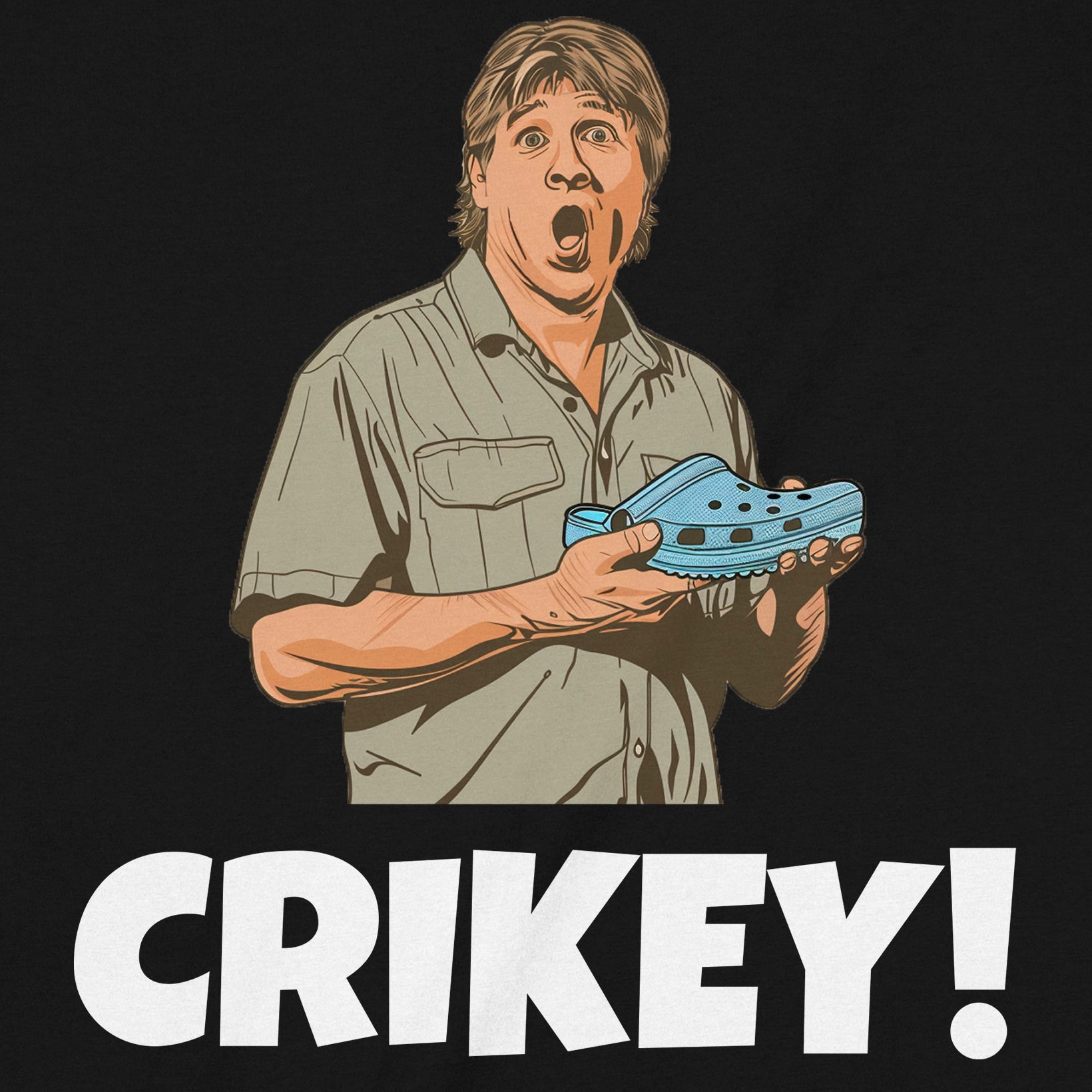 Closeup of Crikey shirt with cartoon man holding crocodile and bold white lettering