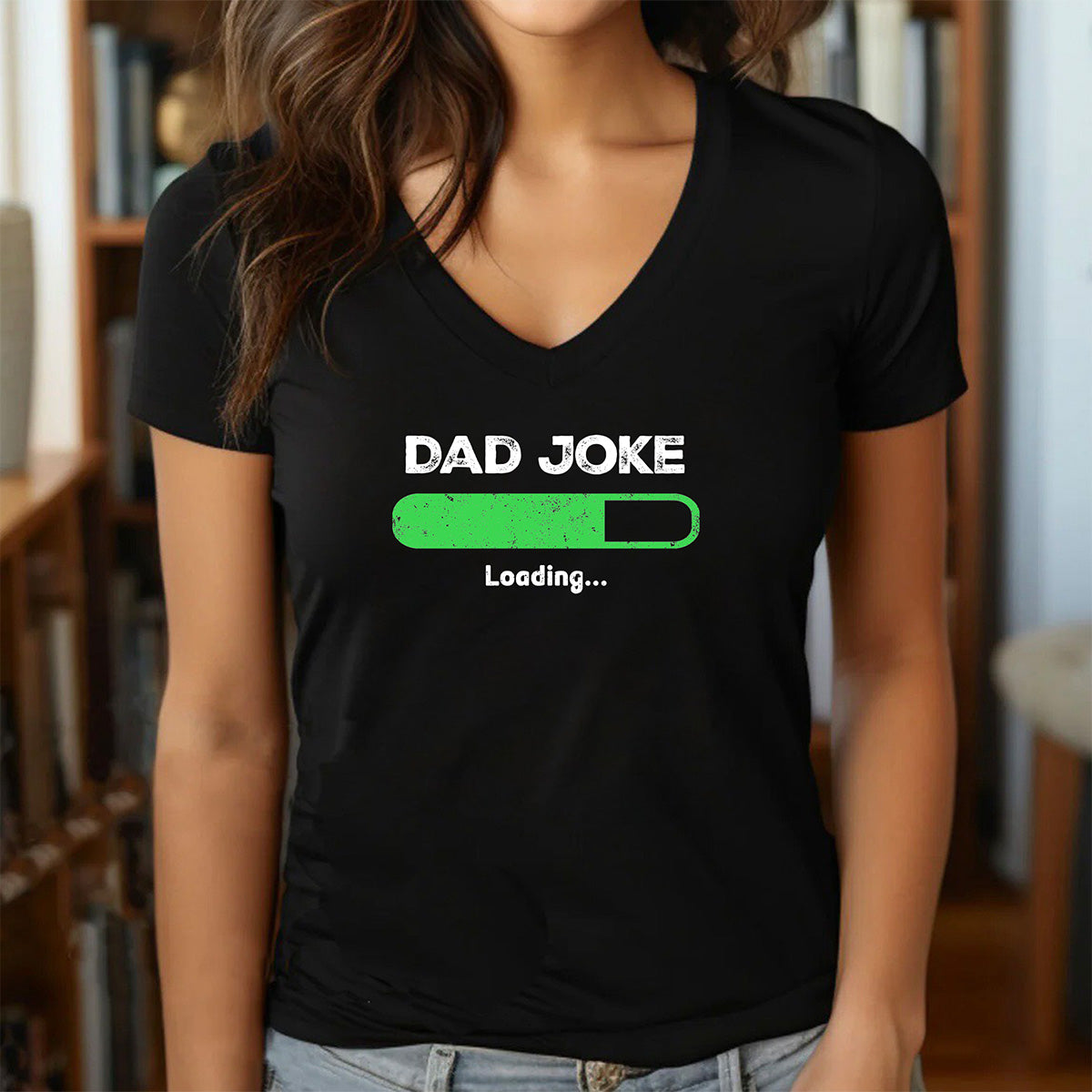 Woman in black v-neck shirt with Dad Joke Loading text and green progress bar humorous design