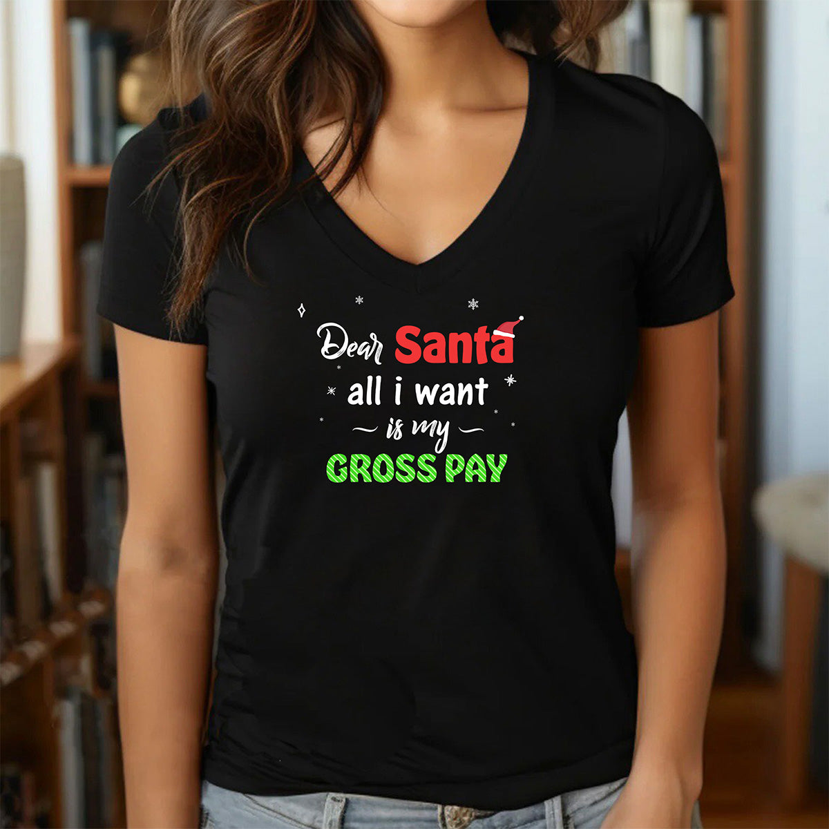 Woman in black v-neck Christmas shirt with Dear Santa all I want is my gross pay holiday design