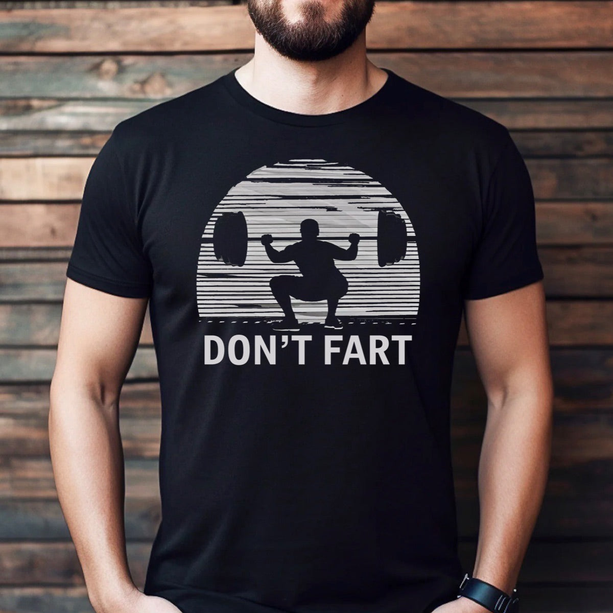Men's black crewneck t-shirt with weightlifter silhouette squat design and text don't fart for gym humor