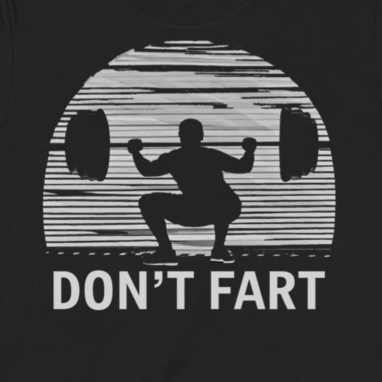 Closeup of black workout t-shirt with weightlifter squatting and funny text don't fart in bold print
