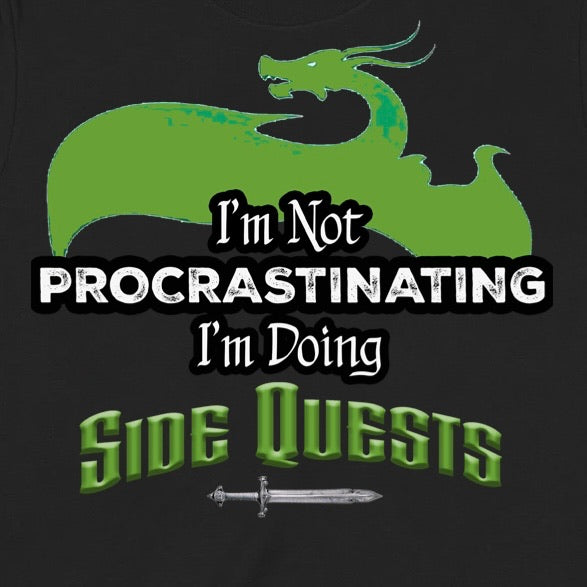 Closeup of black t-shirt with green dragon and sword graphic saying I'm not procrastinating I'm doing side quests