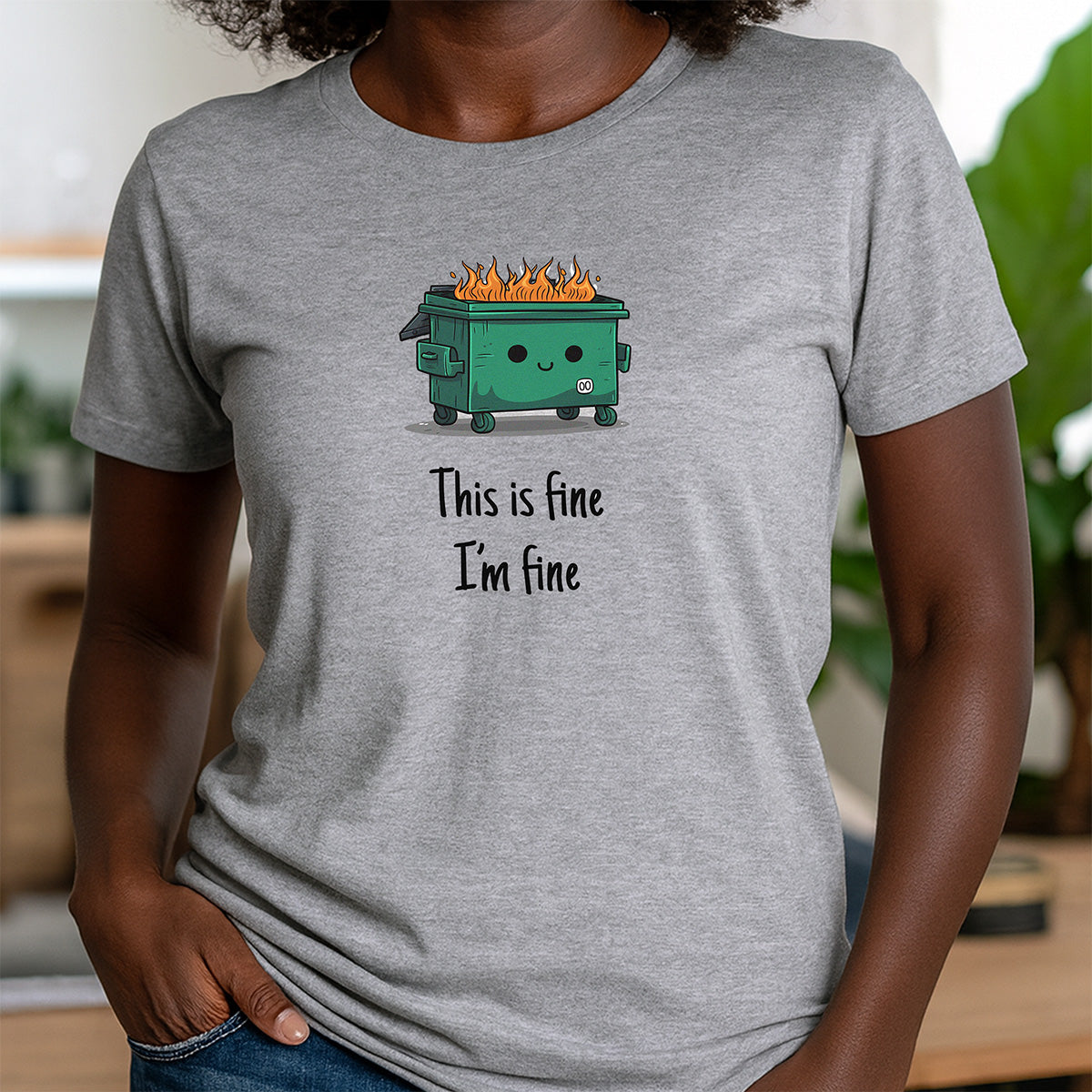 Women's gray crewneck t-shirt with colorful cartoon dumpster fire and text this is fine I'm fine