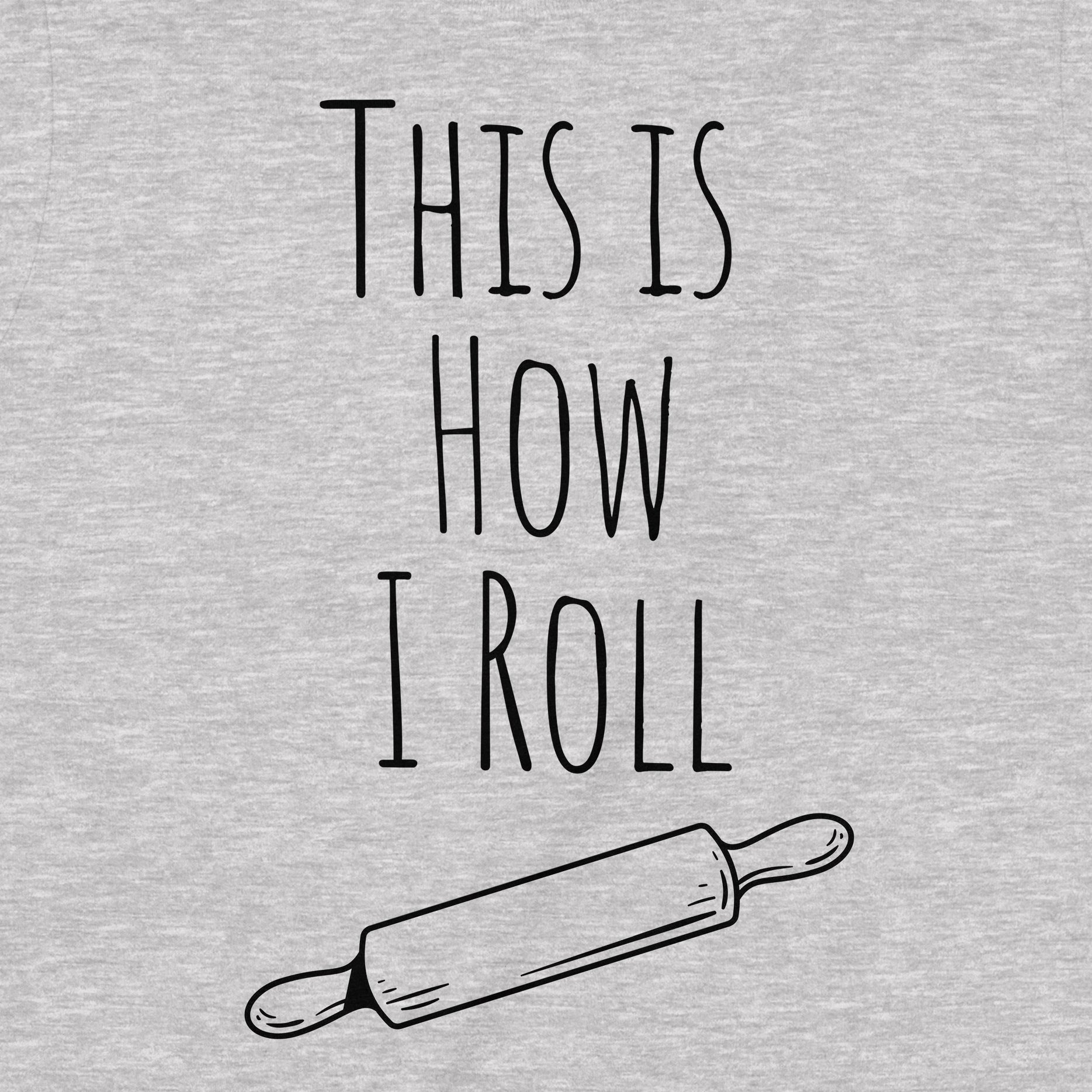 Closeup of gray t-shirt with This Is How I Roll slogan and rolling pin graphic, humorous baking shirt for kitchen enthusiasts