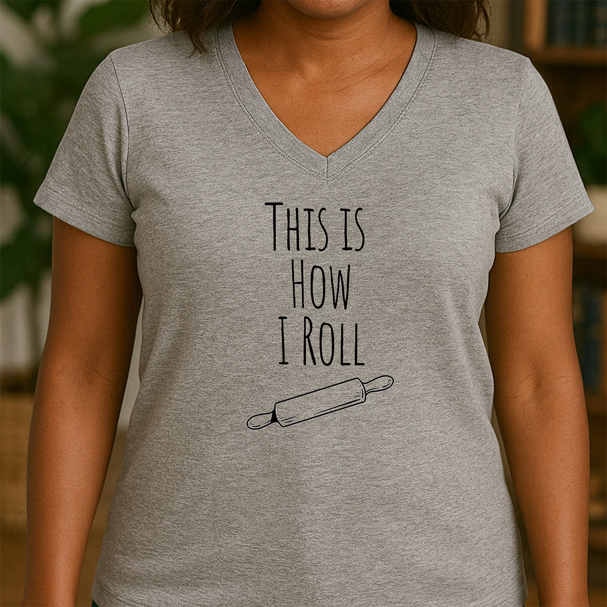 Women’s gray v-neck shirt with This Is How I Roll slogan and rolling pin design, humorous baking tee for kitchen lovers