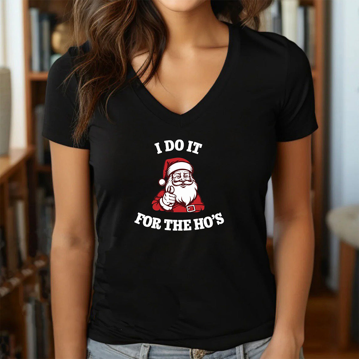 Black women's v-neck Christmas t-shirt with Santa graphic and humorous I do it for the Ho's slogan