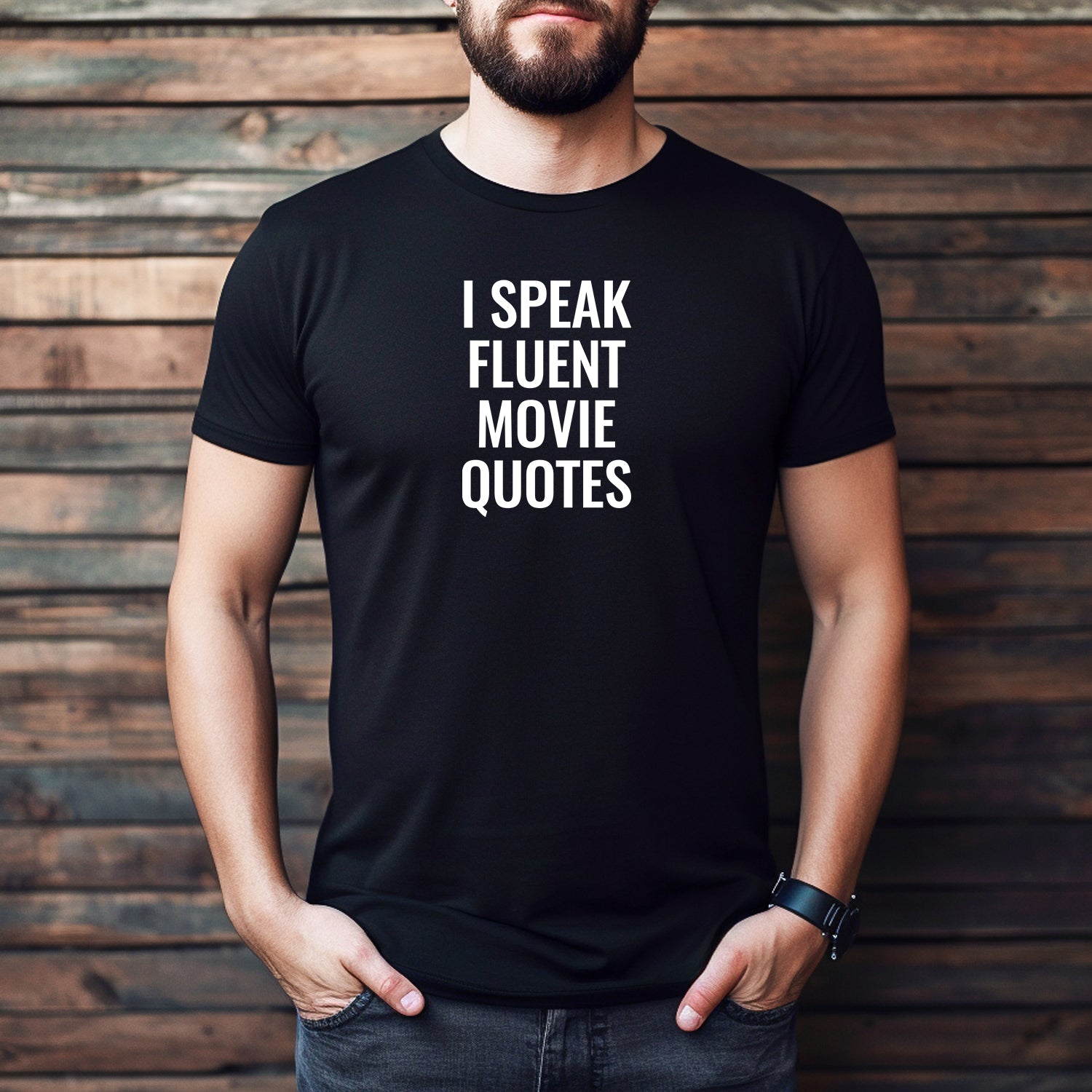 Men’s black crewneck t-shirt with bold white text I Speak Fluent Movie Quotes