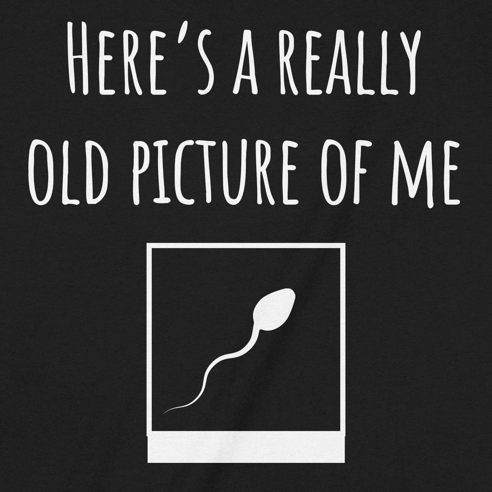 Closeup of here's a really old picture of me text with sperm illustration on black t-shirt
