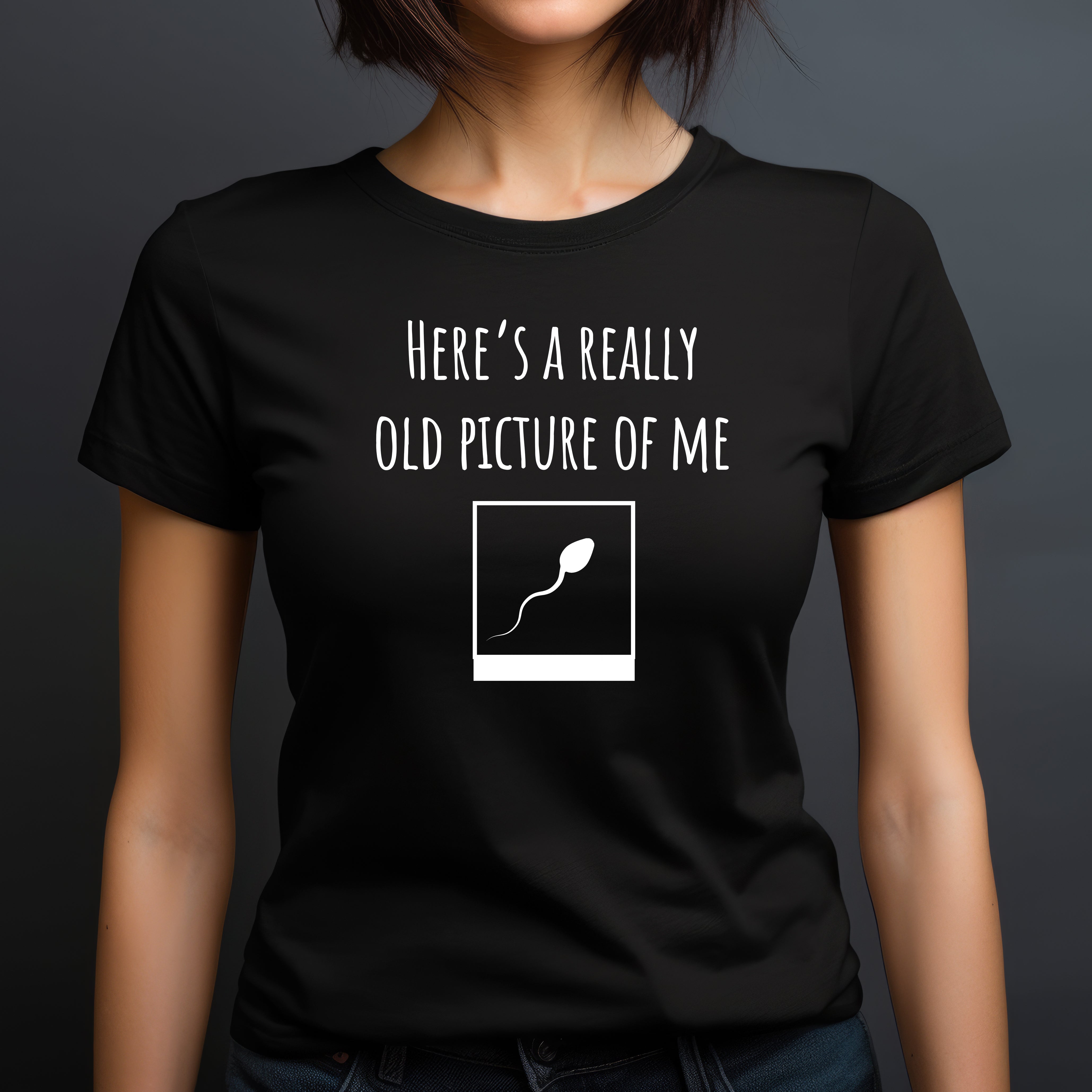 Woman modeling black t-shirt that says heres a really old picture of me with sperm icon