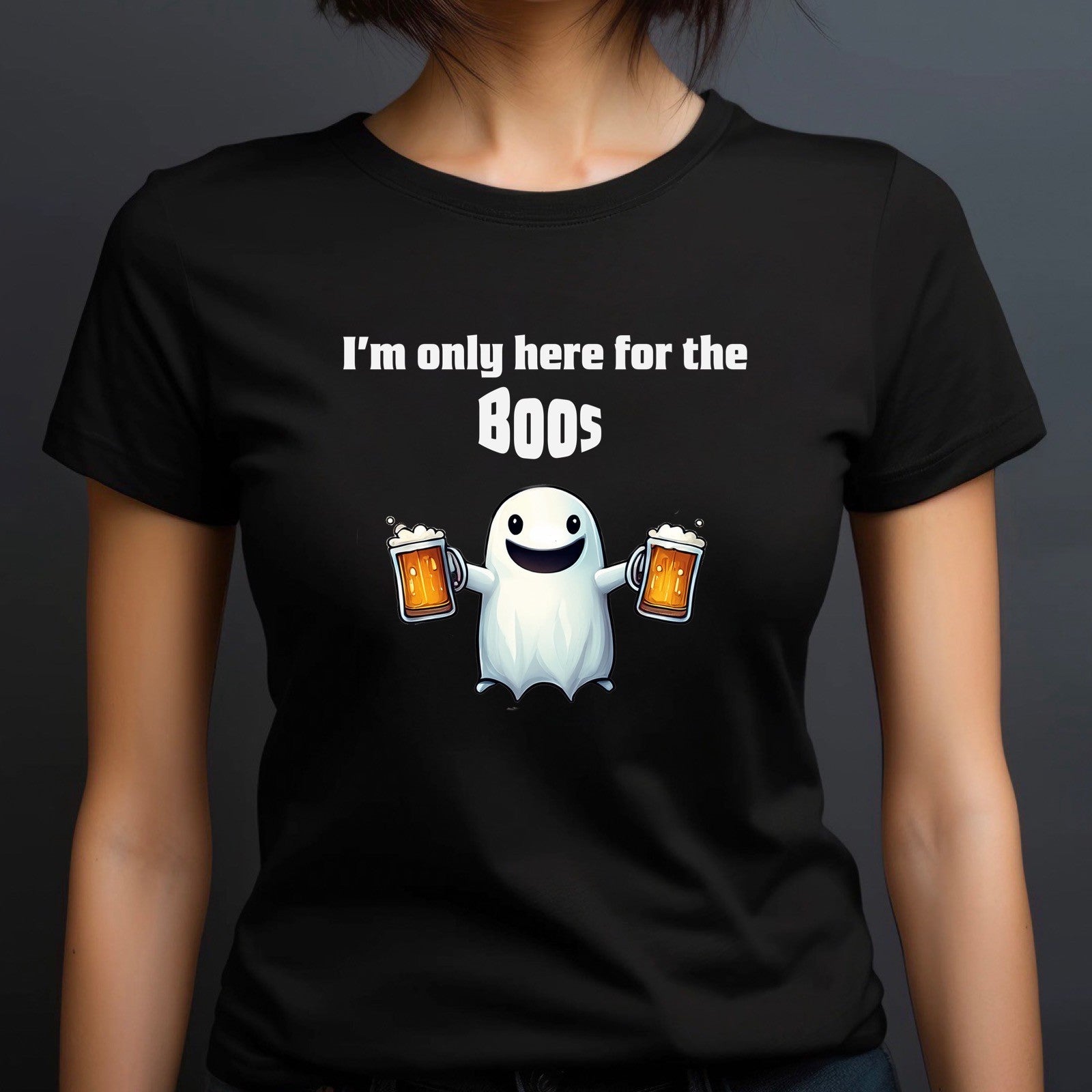 woman in black fitted halloween shirt with ghost illustration holding beer mugs and the words im only here for the boos