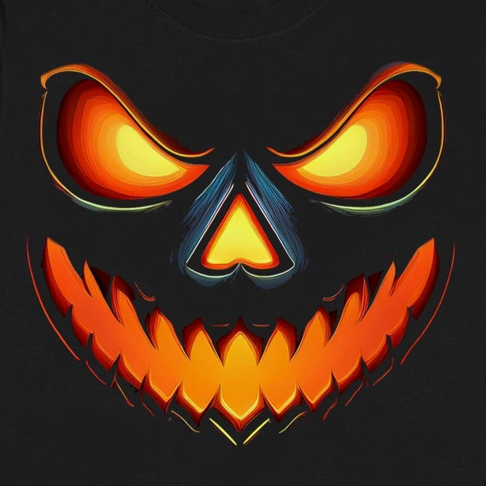 Close-up of glowing jack-o-lantern face graphic printed on black t-shirt