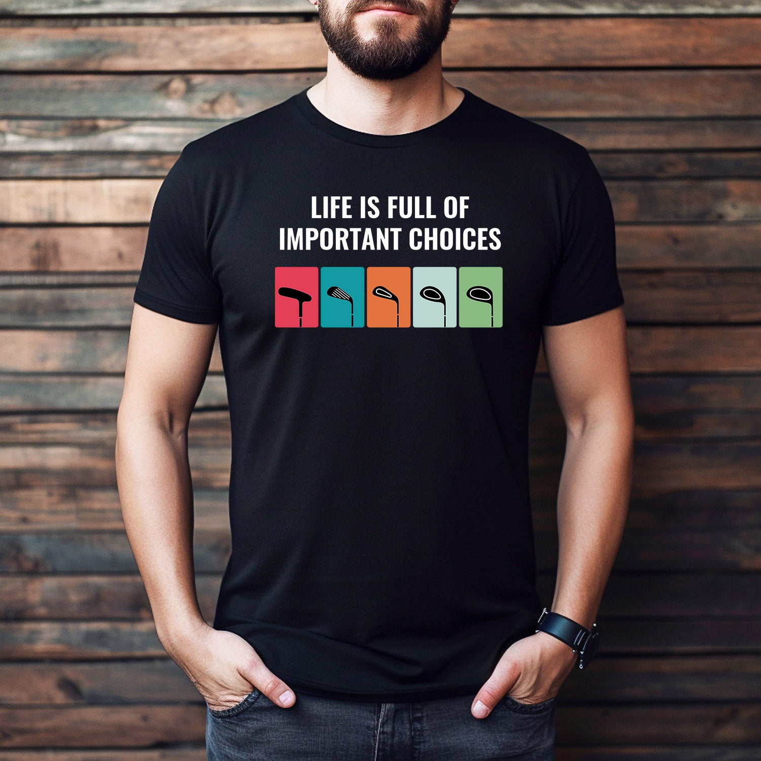 Man wearing black golf t-shirt reading Life Is Full of Important Choices with colorful club icons