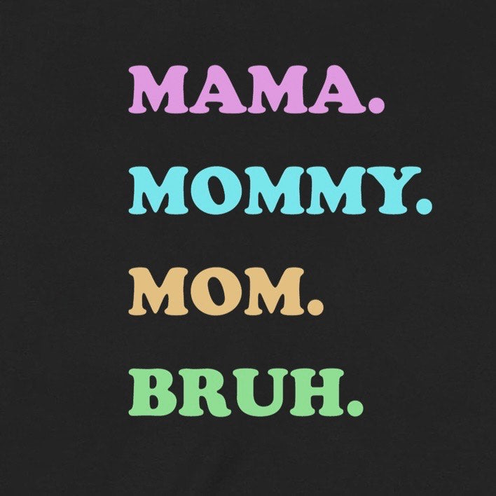 Closeup of colorful Mama Mommy Mom Bruh lettering on black tee, funny motherhood shirt