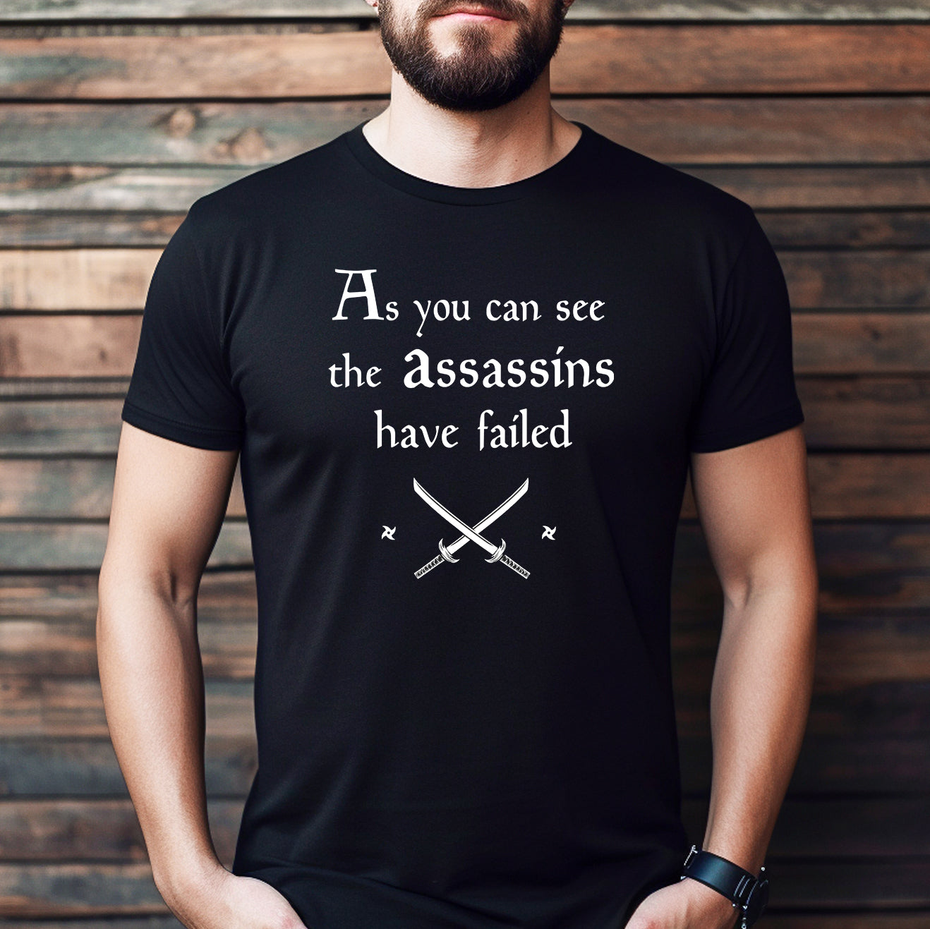 Man wearing black T-shirt that says As you can see the assassins have failed with crossed katana design