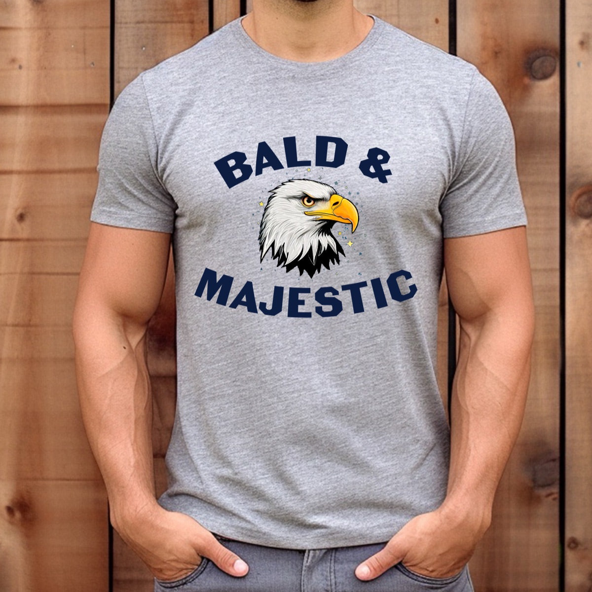 Man wearing grey t-shirt with Bald & Majestic bald eagle graphic design