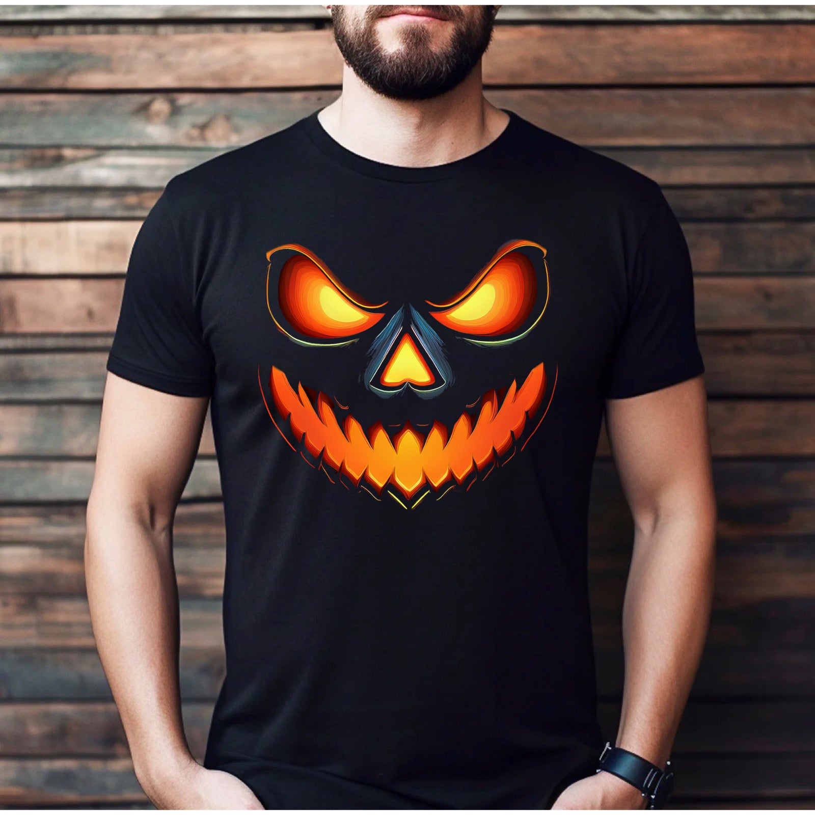 Men’s black Halloween t-shirt with glowing jack-o-lantern face, model against wooden wall
