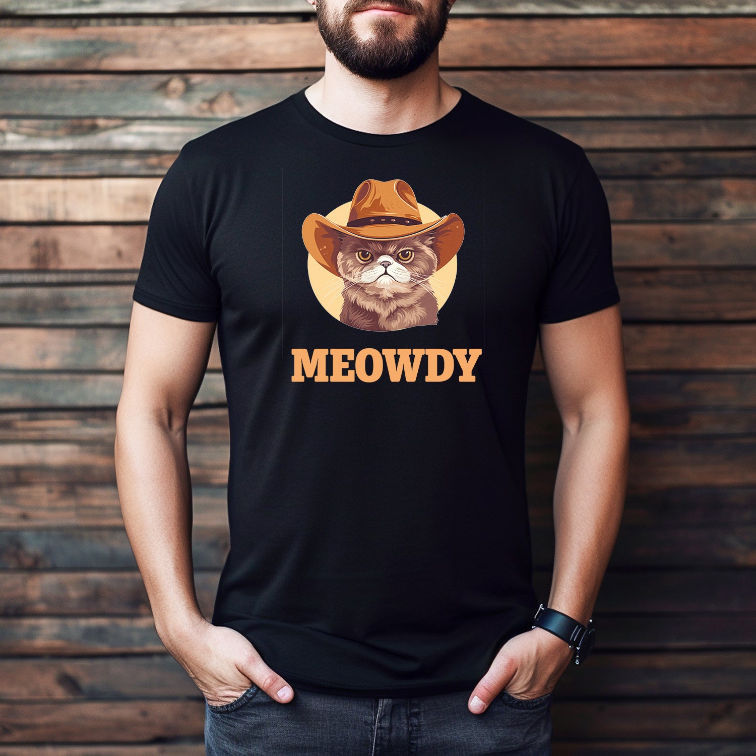 Man wearing black MEOWDY cowboy cat graphic tee, casual fit novelty Western cat shirt