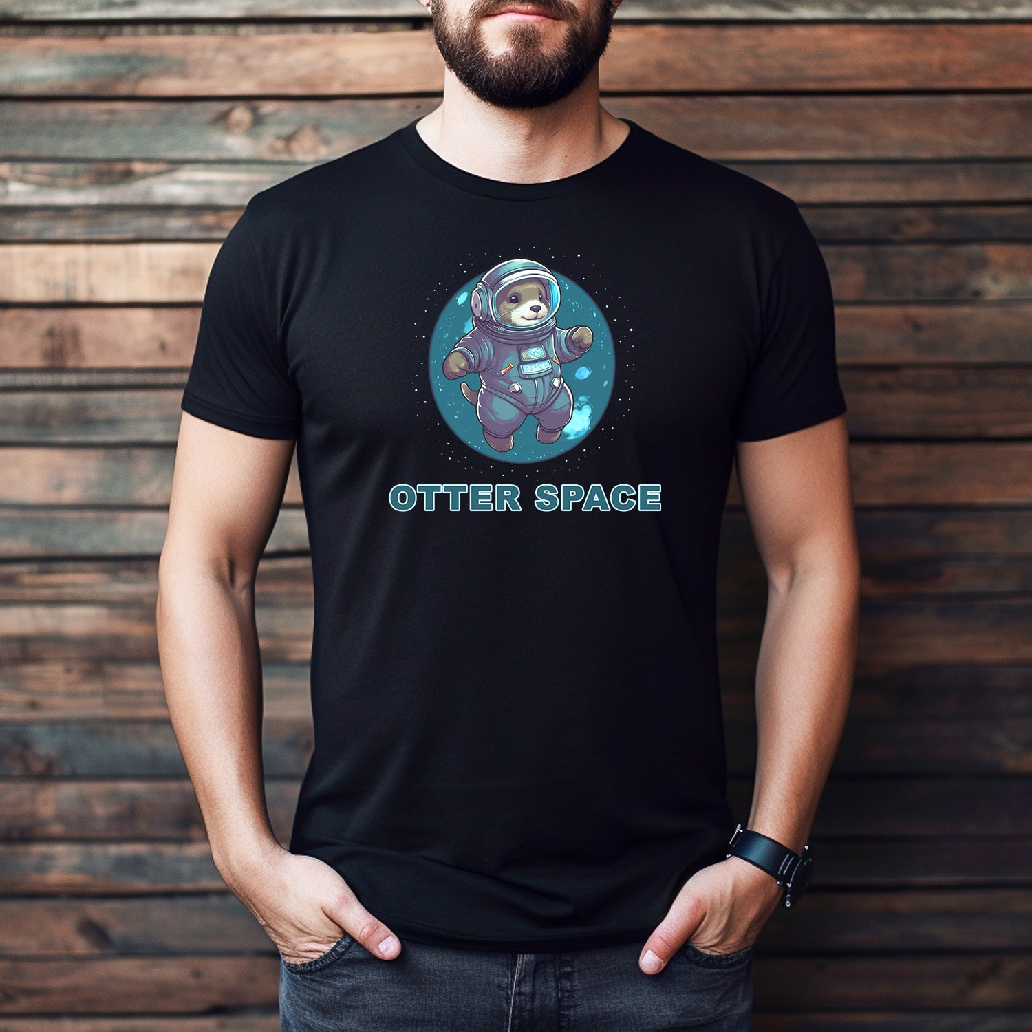 Man wearing black OTTER SPACE otter astronaut t-shirt, casual fit, humorous space pun design.