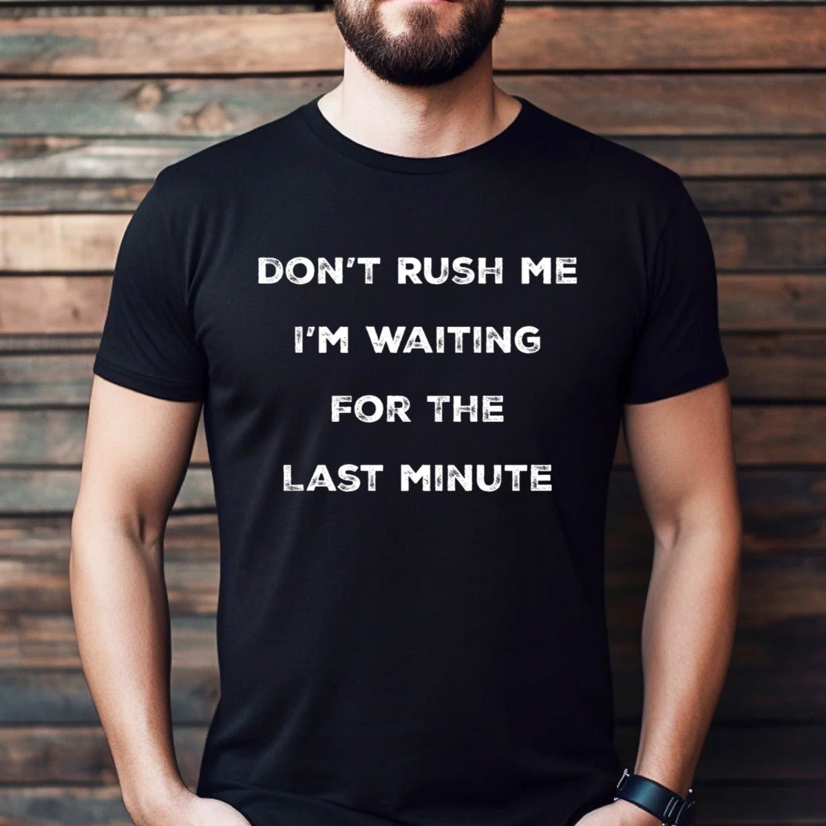Man wearing black procrastination humor shirt with white text don't rush me I'm waiting for the last minute