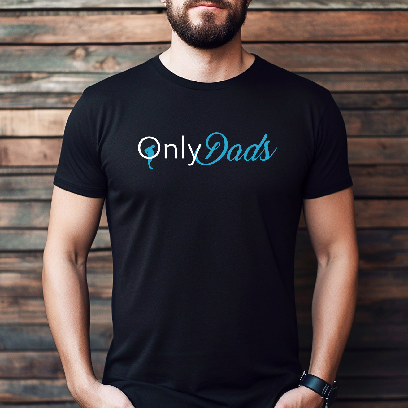 Man wearing a black OnlyDads parody t-shirt with blue and white logo design