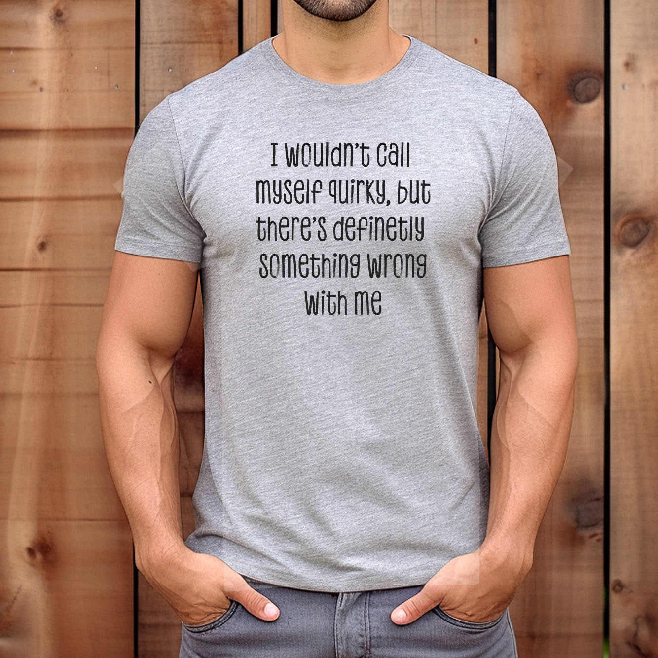 Man wearing grey funny graphic tee with quote I wouldn’t call myself quirky but there’s something wrong with me