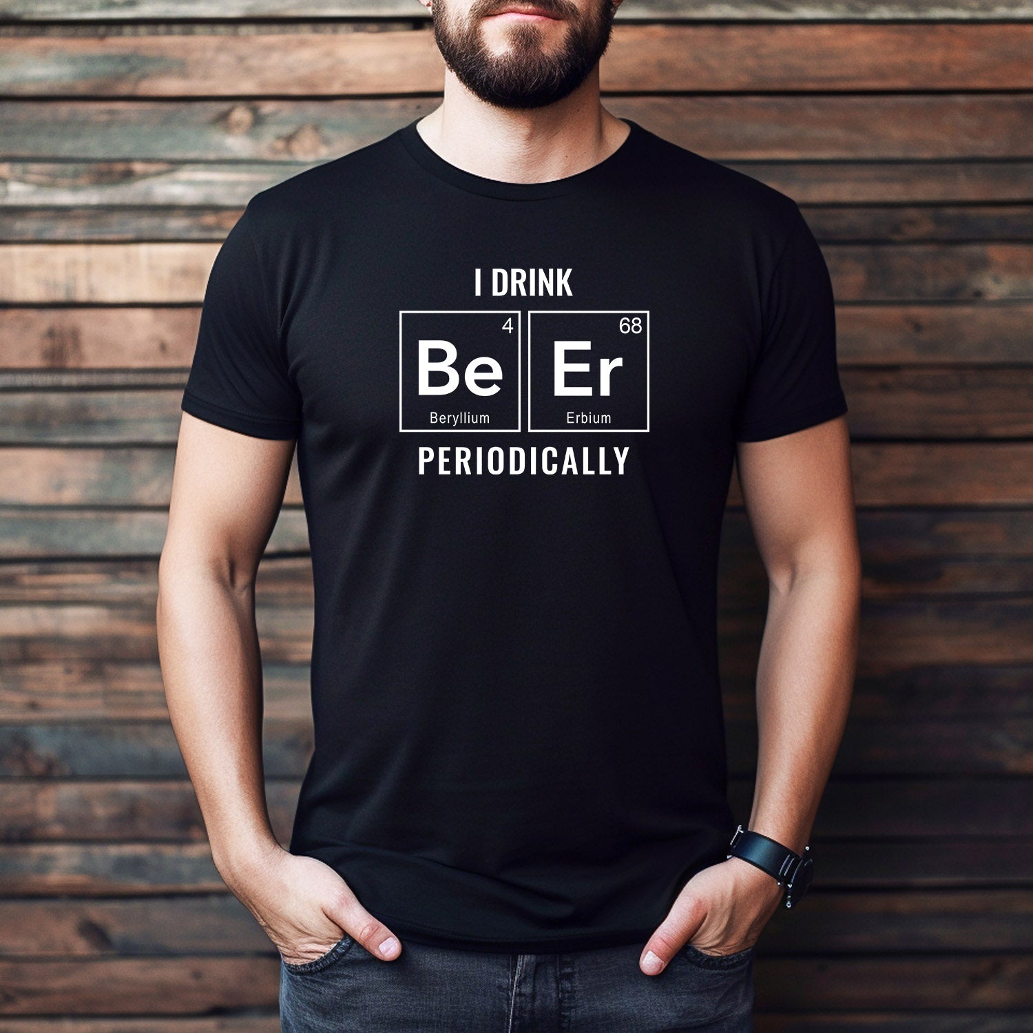 Man wearing black funny beer t-shirt with periodic table design and text "I drink beer periodically."