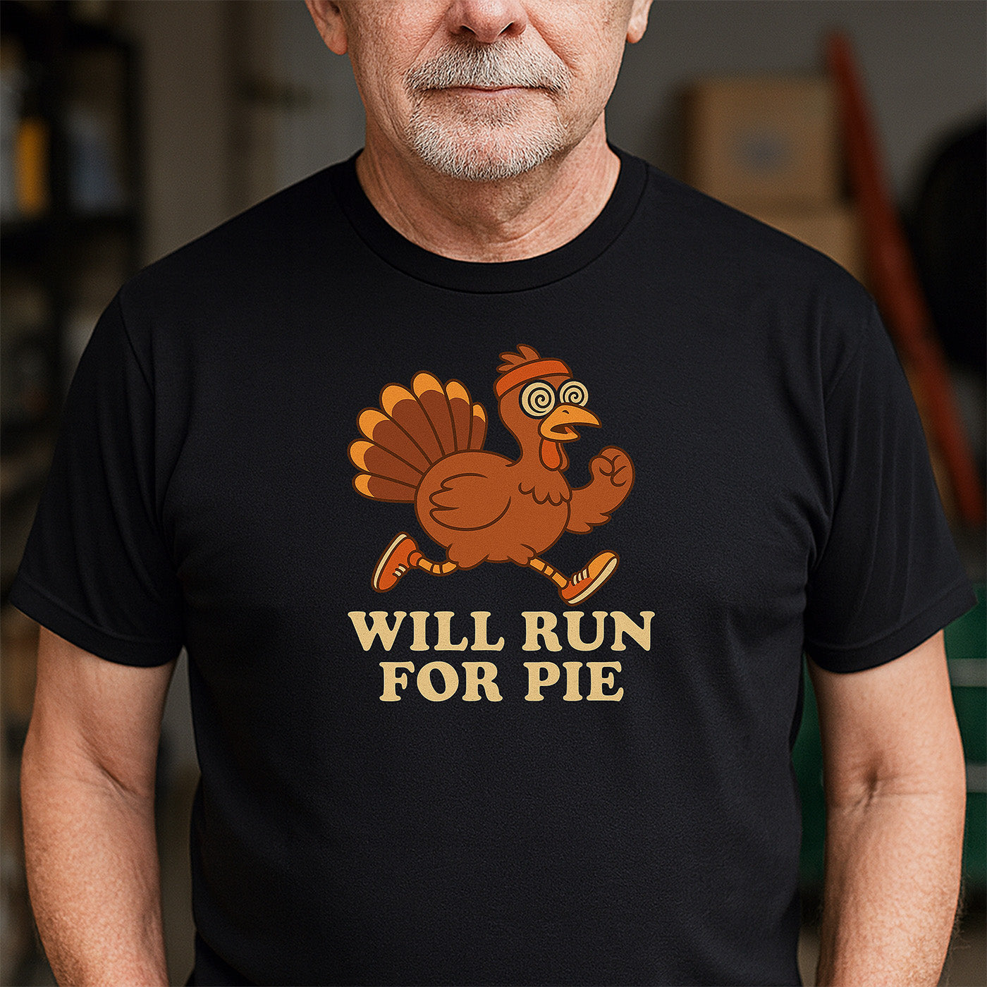 older man wearing black t-shirt with running turkey and words will run for pie funny design