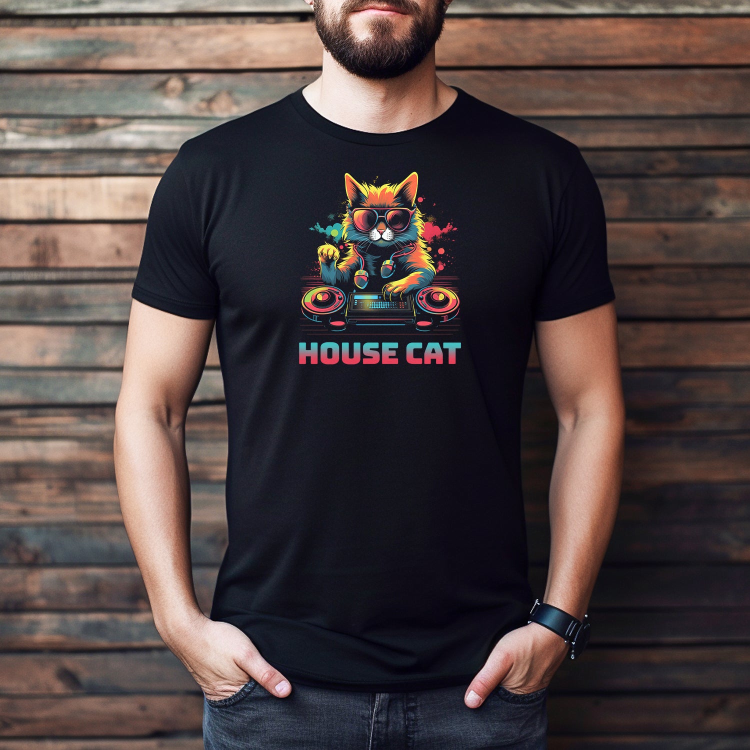 Man wearing black House Cat DJ t-shirt featuring colorful cat at turntables, fun music tee