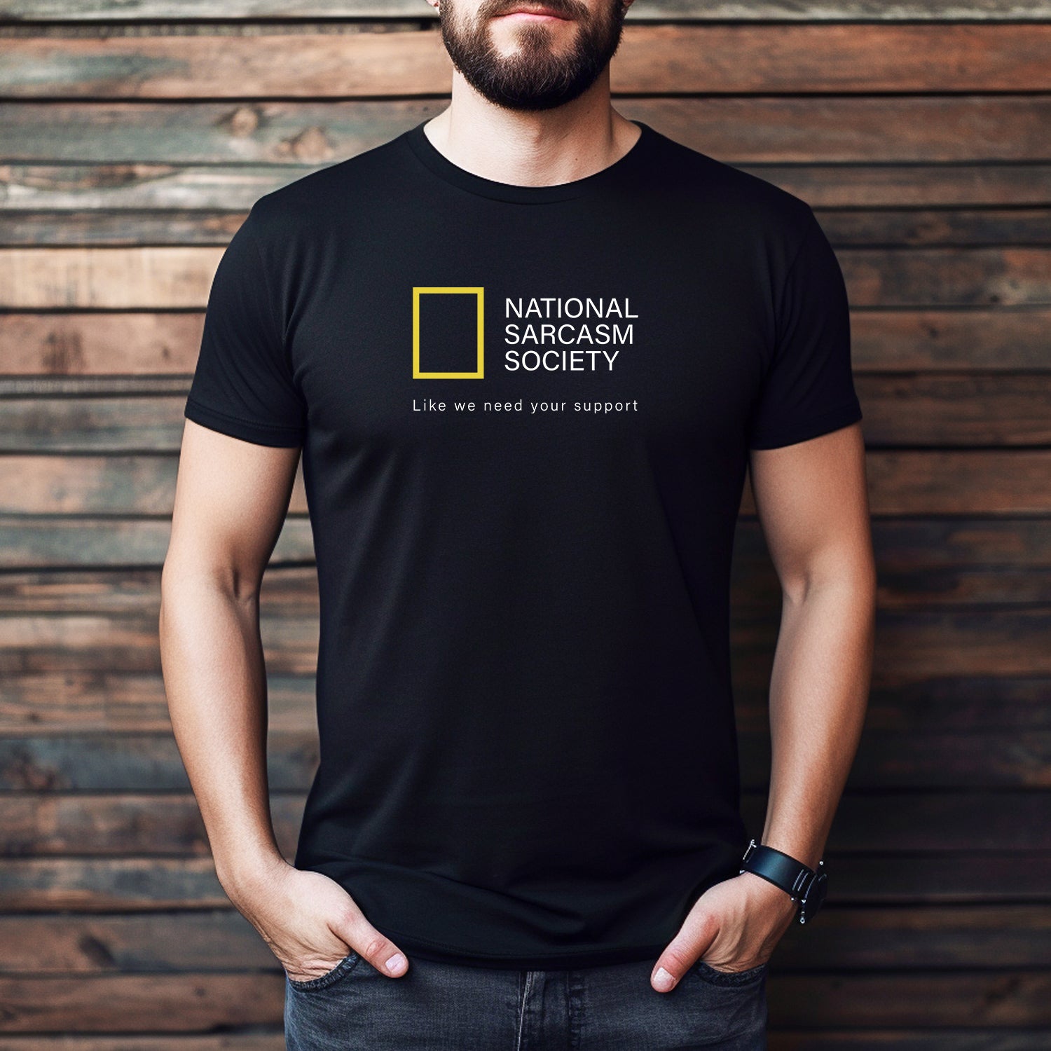 Men’s black crewneck t-shirt with witty National Sarcasm Society design and slogan Like we need your support