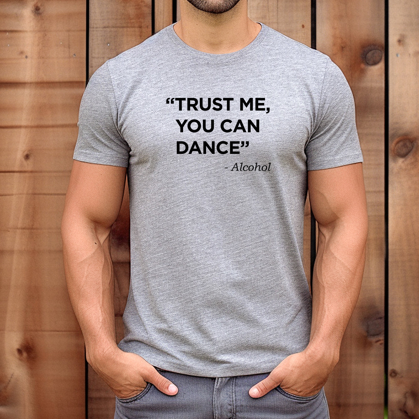 Man wearing a black T-shirt that says “Sarcasm is my love language” with colorful floral accents.