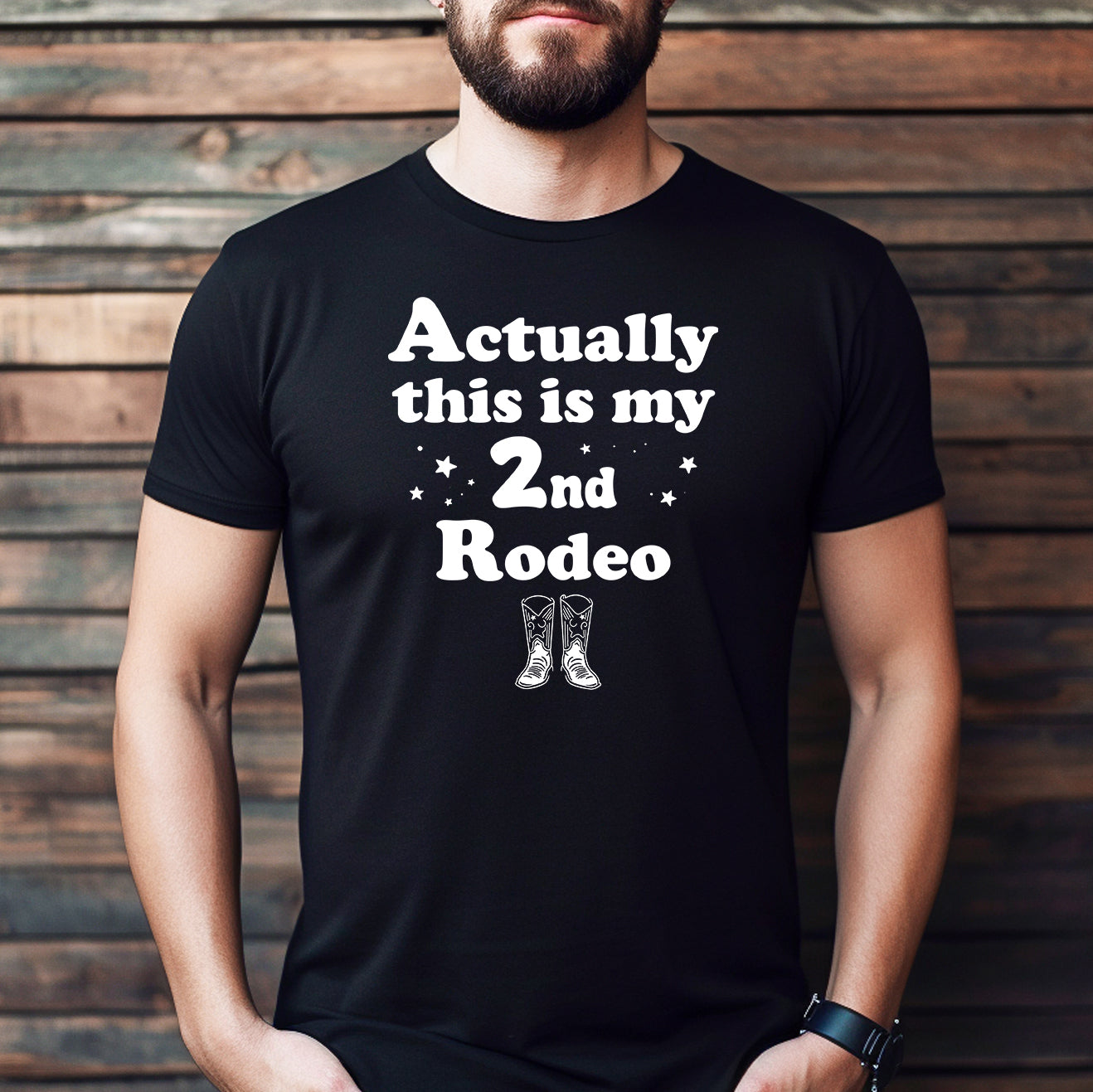 Man wearing black shirt with white text Actually this is my 2nd Rodeo and cowboy boots design