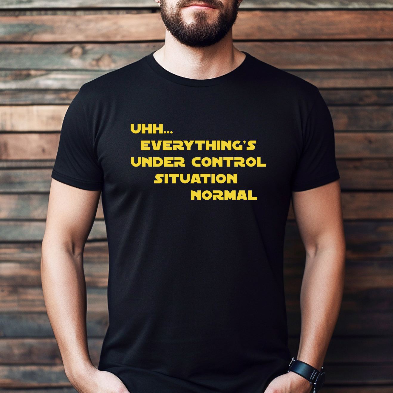 Man wearing black funny Star Wars quote shirt with yellow text situation normal everything’s under control
