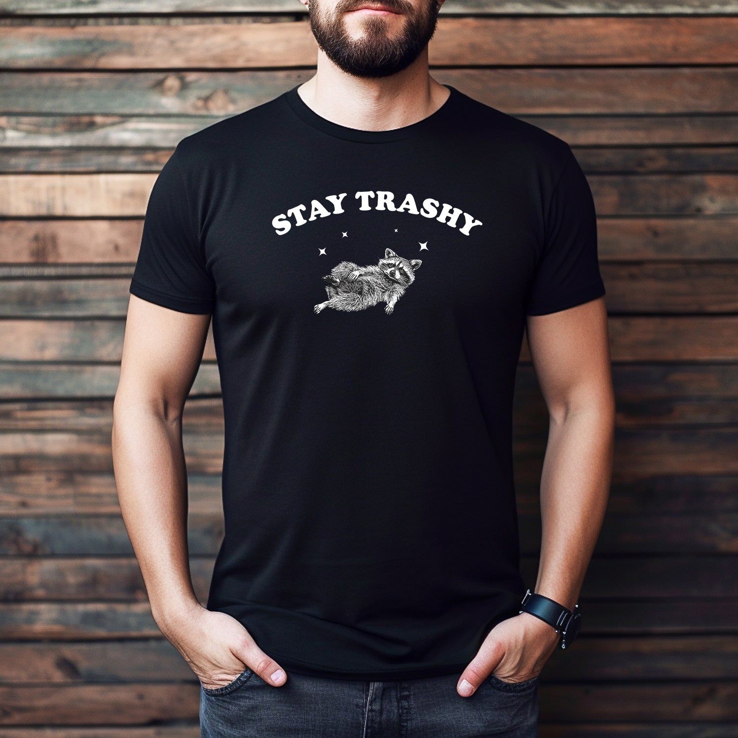 Man wearing black “Stay Trashy” raccoon T-shirt with funny graphic design.