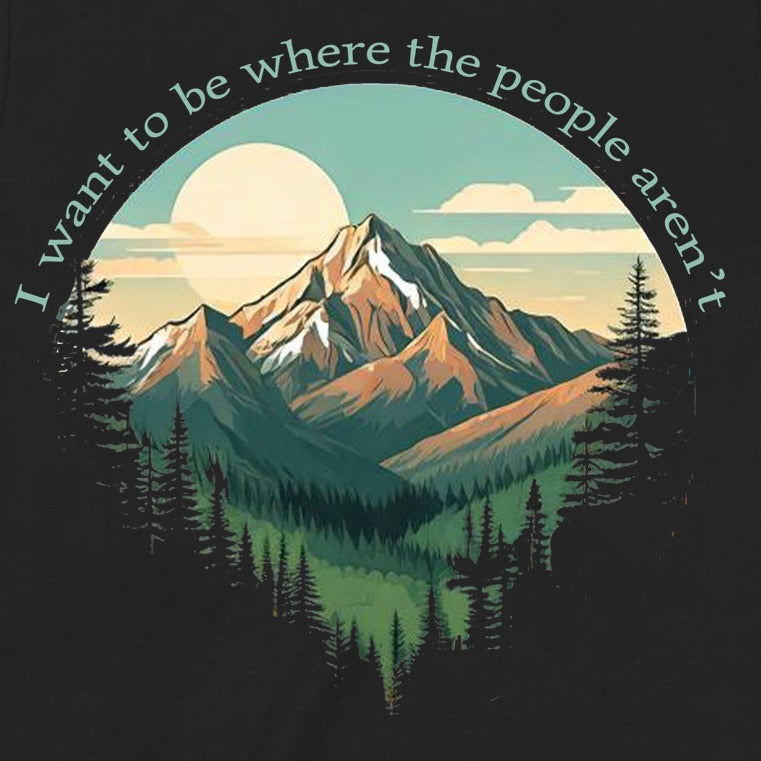 Closeup of mountain design with trees, sunset, and text I want to be where the people aren't