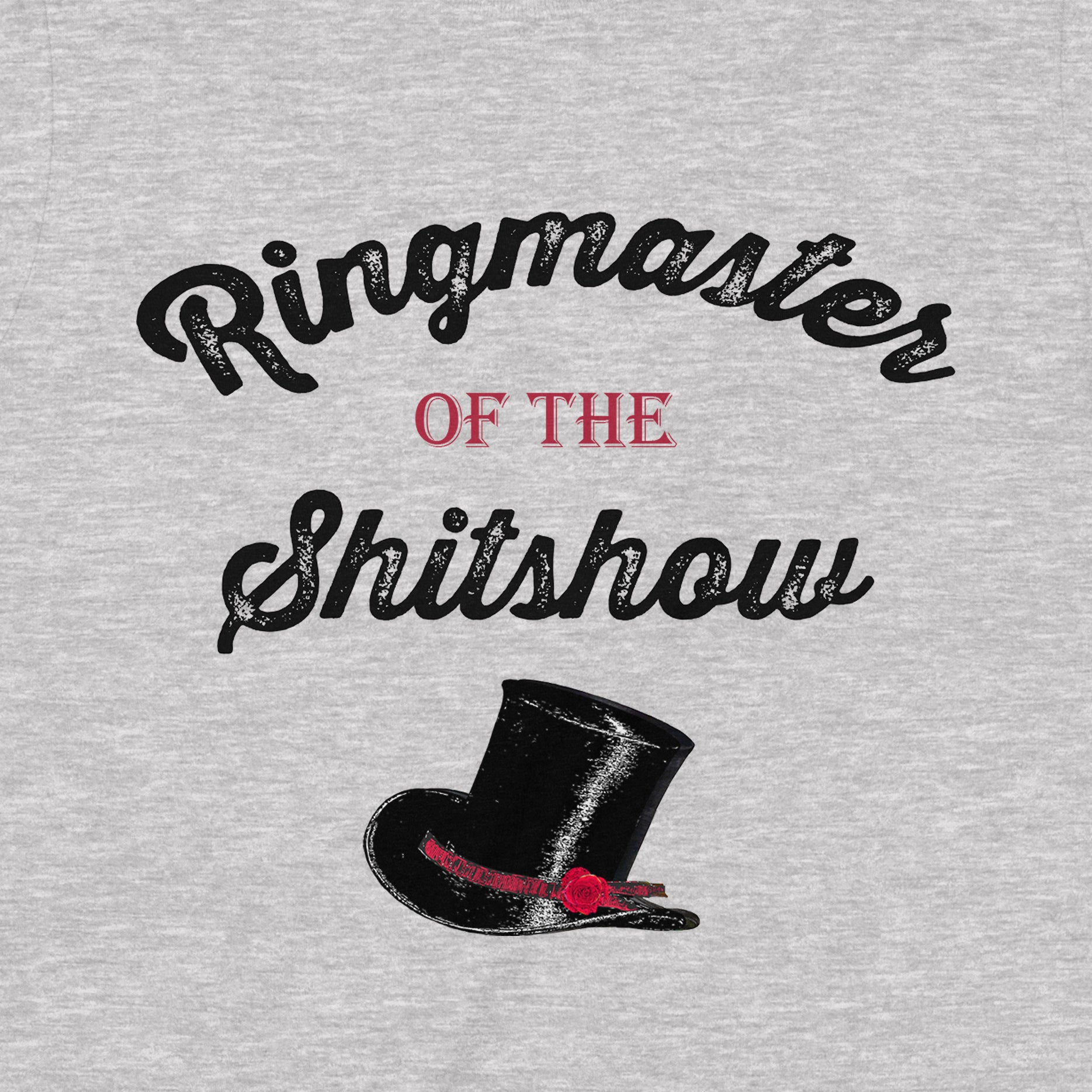 Closeup of Ringmaster of the Shitshow lettering and black top hat with red band on heather gray T-shirt