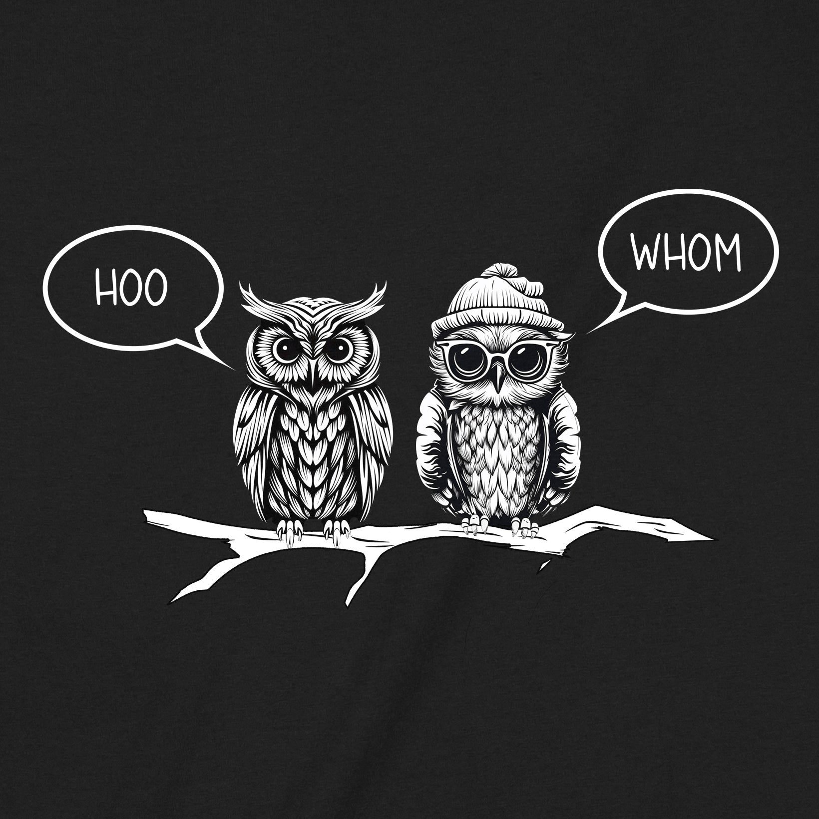 Closeup of black shirt featuring two owls with speech bubbles hoo and whom, funny grammar pun design