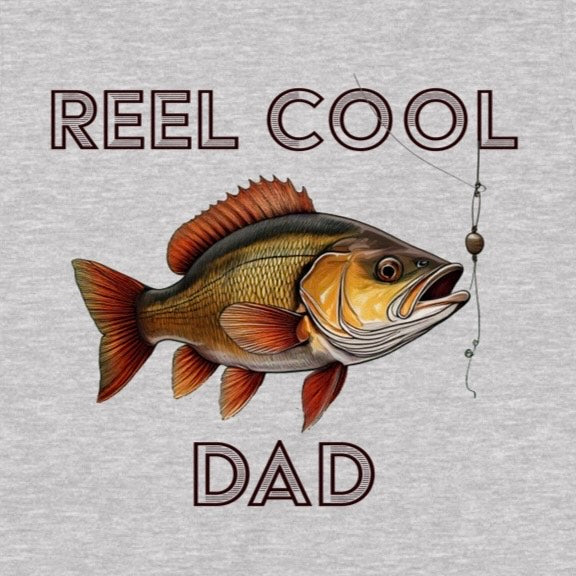 Closeup of Reel Cool Dad shirt showing fish illustration with hook and bold text