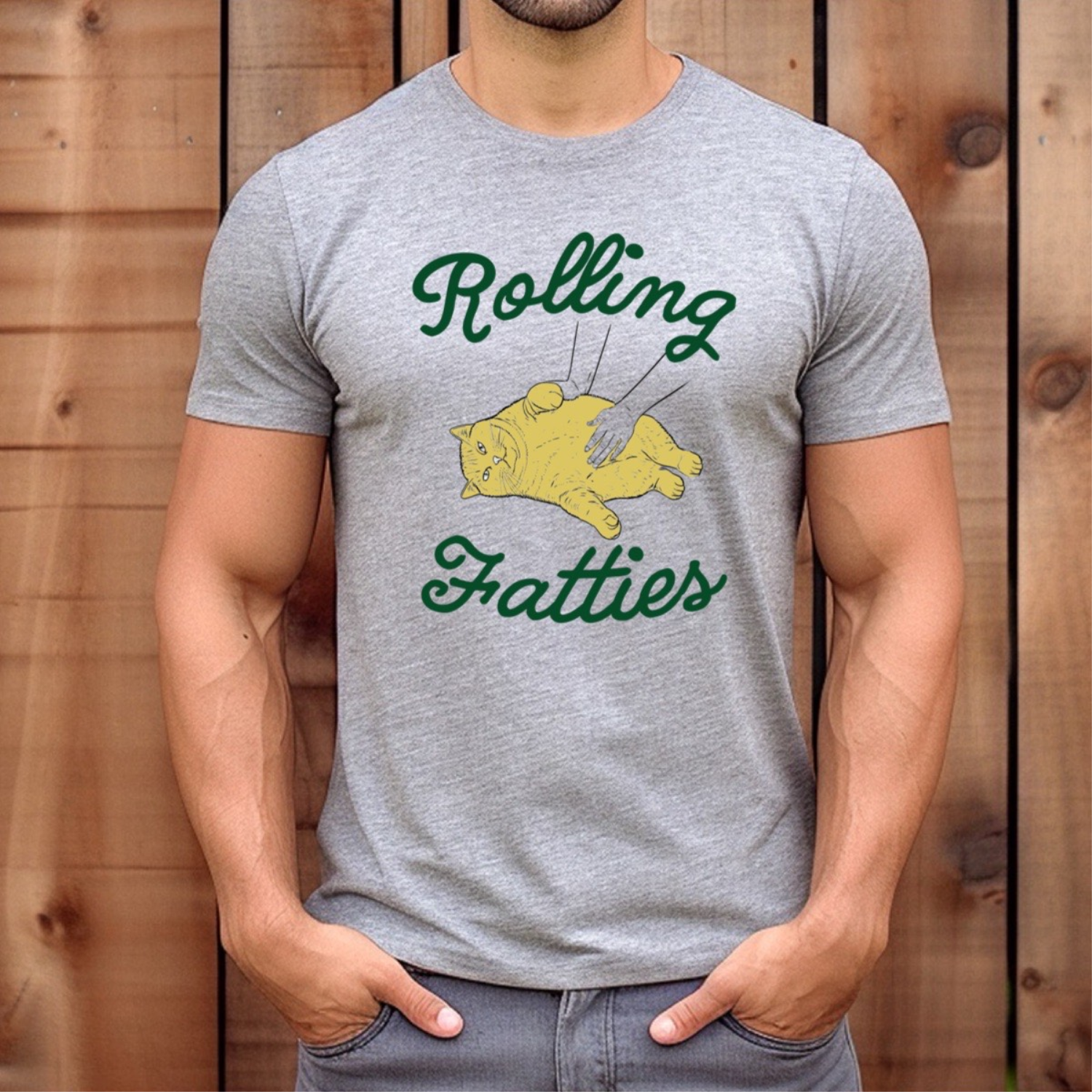 Man wearing gray Rolling Fatties shirt with cartoon yellow cat belly rub design