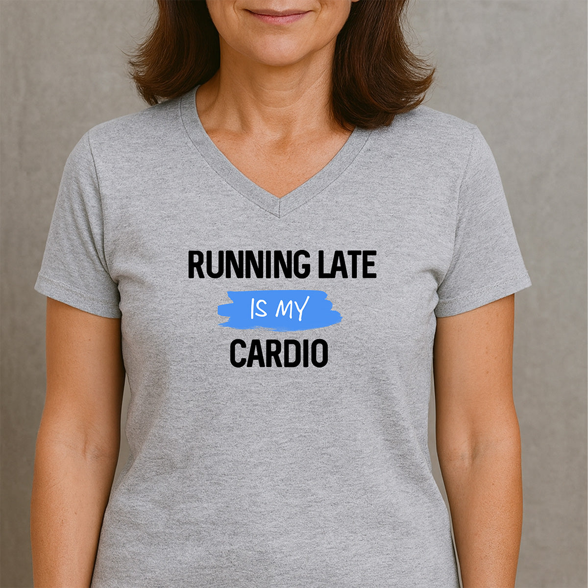 Woman wearing gray v-neck shirt with humorous running late is my cardio text design
